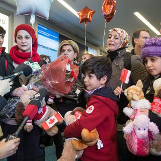 Les initiatives d’aide aux réfugiés syriens se multiplient au Canada. [The Canadian Press/AP/Keystone - Darryl Dyck]