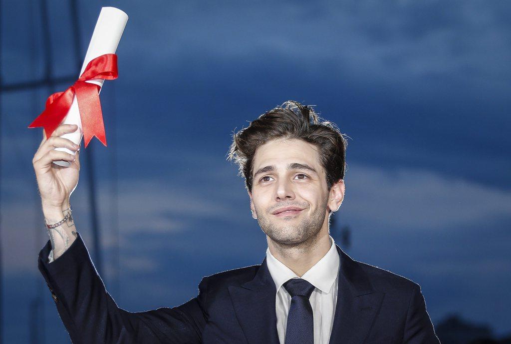 Le Grand prix du Festival de Cannes a été remis dimanche soir au cinéaste canadien Xavier Dolan, 27 ans, pour "Juste la fin du monde". [Keystone - Julien Warnand - EPA]