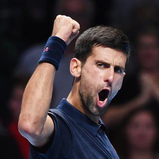 Novak Djokovic a battu Dominic Thiem en trois sets. [Keystone - Andy Rain - EPA]