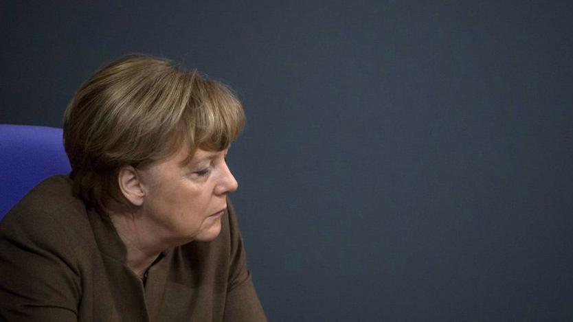 Angela Merkel pâtit de sa politique migratoire et des récents attentats. [EPA/Keystone - Michael Kappeler]