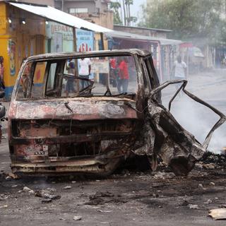 Le calme est revenu à Kinshasa, mais les stigmates des violences demeurent. [Keystone - AP Photo/John Bompengo]