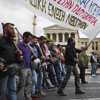 Les Grecs ont manifesté ce week-end dans les rues du pays. C'était la quatrième grève générale depuis le mois de septembre. [Keystone - Petros Giannakouris - AP Photo]