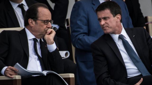 François Hollande (gauche) et son Premier ministre Manuel Valls. [epa/keystone - Christophe Petit Tesson]