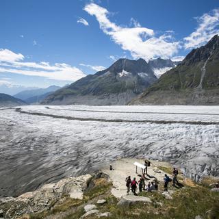 Les glaciers, comme celui d'Aletsch, fondent à une vitesse record depuis le début des années 2000. [Keystone - Dominic Steinmann]