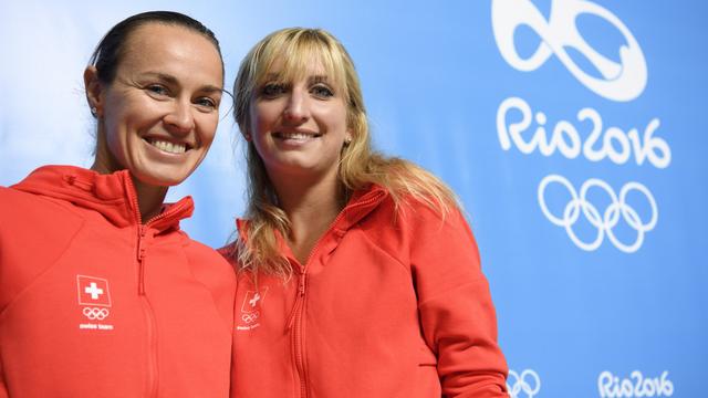 Martina Hingis et Timea Bacsinszky affrontent lundi les Américaines Bethanie Mattek-Sands et Coco Vandeweghe. [Laurent Gillieron)]