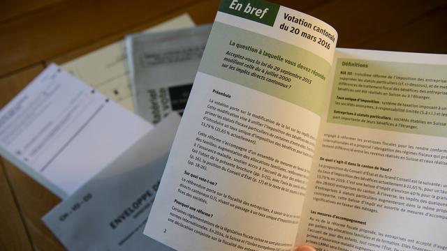 La réforme de la fiscalité des entreprises passe le test des urnes dans le canton de Vaud ce dimanche 20 mars. [Keystone - Jean-Christophe Bott]