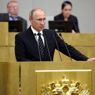 Vladimir Poutine lors de son discours mercredi devant le Parlement russe fraîchement élu. [Sputnik/Reuters - Kremlin/Alexei Nikolsky]