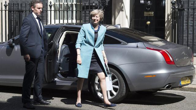 Theresa May a poursuivi jeudi ses consultations pour former son gouvernement. [EPA/Keystone - Will Oliver]