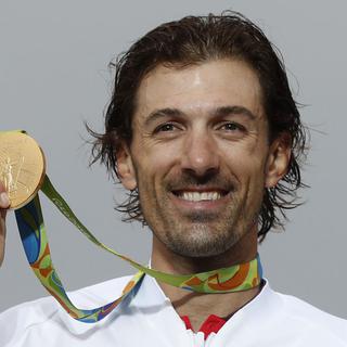 Fabian Cancellara et sa médaille olympique, Rio de Janeiro le 10 août 2016. [Keystone - Patrick Semansky]