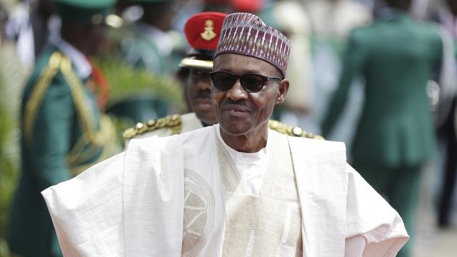 Muhammadu Buhari a vu le cours du pétrole chuter de plus de 50% pendant son mandat. [Keystone - AP Photo/Sunday Alamba]