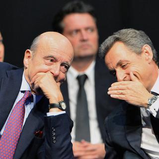 Alain Juppé et Nicolas Sarkozy. [Keystone - Nicolas Tucat]