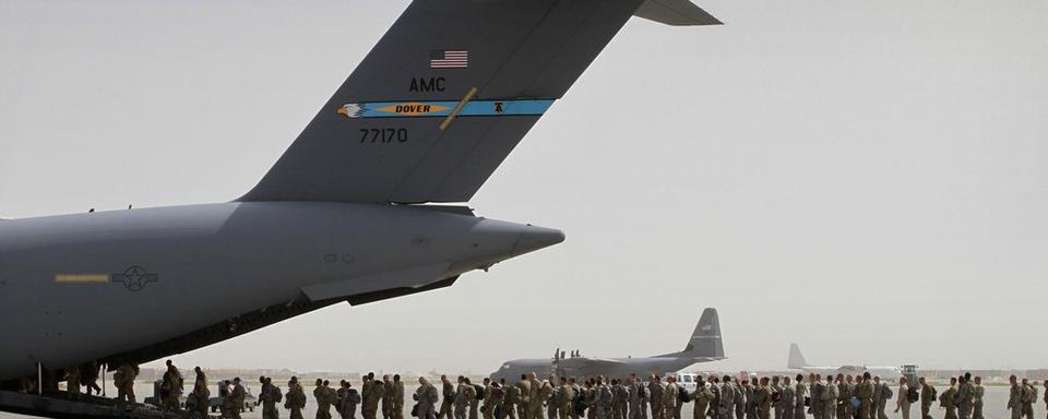 Des soldats américains sur la base américaines de Bagram, en Afghanistan (image d'illustration). [ap/keystone - Musadeq Sadeq]