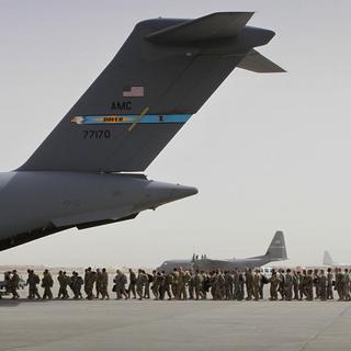 Des soldats américains sur la base américaines de Bagram, en Afghanistan (image d'illustration). [ap/keystone - Musadeq Sadeq]