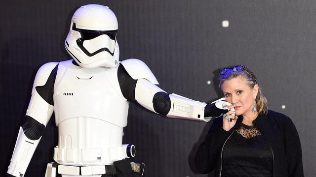 Carrie Fisher, photographiée le 16 décembre 2015, lors de la sortie du dernier "Star Wars". [Facundo Arrizabalaga]
