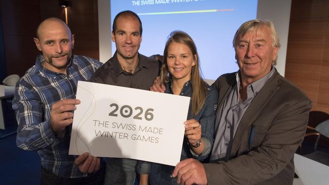 W.Besse, D.Défago, C.Chable et R.Collombin soutiennent la candidature "The Swiss Made Winter Games". [Gillieron]