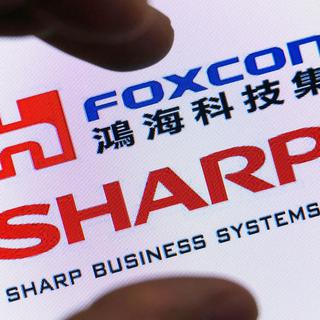 Les discussions se prolongent entre le géant taïwanais de l'électronique Foxconn et l'ancienne gloire japonaise Sharp. [AFP - Li shengli - Imaginechina]