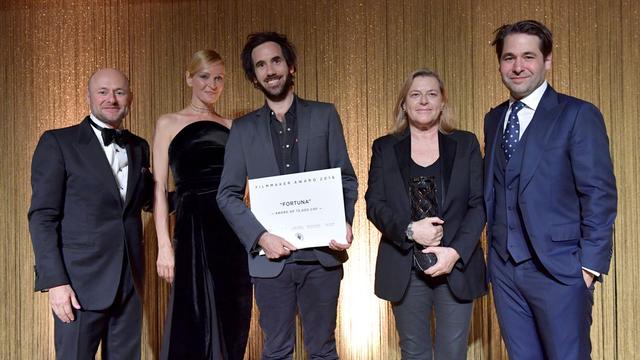 Georges Kern, Uma Thurman, Germinal Roaux, Ruth Walburger et Karl Spoerri posent lors du dîner de gala du Festival du film de Zurich. [PPR/Getty Images for IWC/ Keystone - Harold Cunningham]