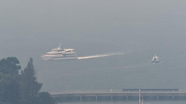 Bateau en provenance de l'île de Batam arrivant à Singapour en août 2016 (image prétexte). [AFP - Roslan Rahman]