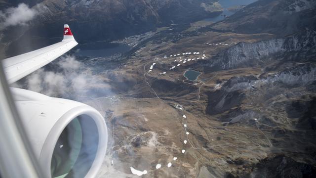 Une délégation de Swiss-Ski a survolé les pistes de la station grisonne à l'occasion d'une journée de reconnaissance. [Ennio Leanza]