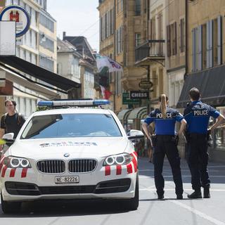Face à un phénomène qui touche notamment le centre-ville de Neuchâtel, la police a mis sur pied l’opération Narko en 2014. [Keystone - Sandro Campardo]