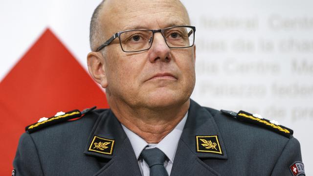 Le Valaisan Philippe Rebord lors de la conférence de presse du conseiller fédéral Guy Parmelin annonçant sa nomination à la tête de l'armée vendredi à Berne. [Keystone - Peter Klaunzer]