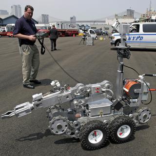 Robot-tueur Remotec Andros, qui aurait été utilisé par la police pour neutraliser le tueur de Dallas. [Getty Images/AFP - Michael Nagle]