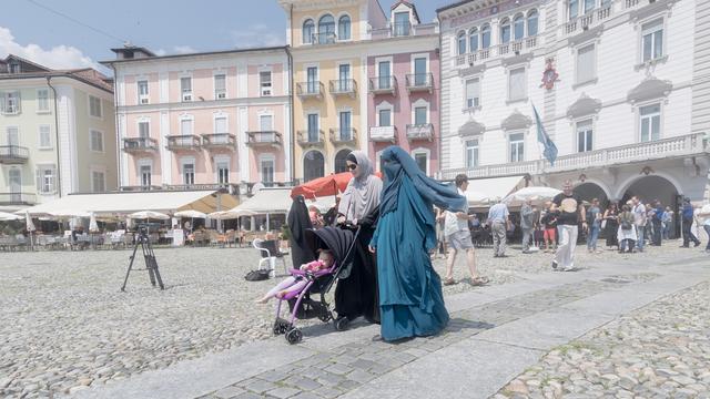 Une loi interdisant de se dissimuler le visage est déjà entrée en vigueur au Tessin. [KEYSTONE - Ti-Press/Pablo Gianinazzi]