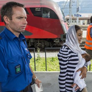 Des migrants à la gare de Buchs (SG). [key - Dominic Steinmann]