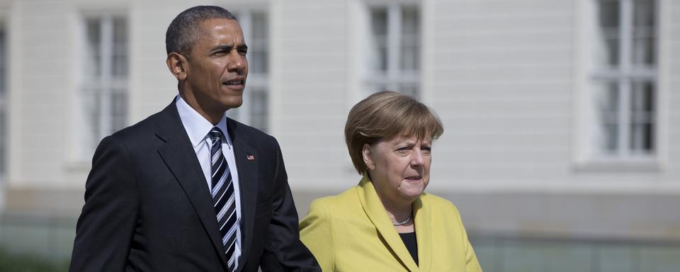 Le président américain Barack Obama et la chancelière allemande Angela Merkel à Hanovre ce dimanche 24 avril. [Keystone - Carolyn Kaster - AP Photo]