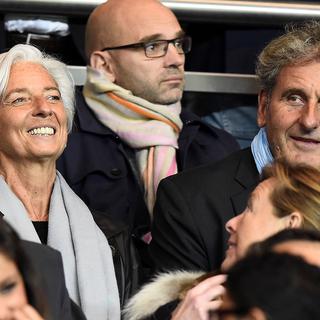 Christine Lagarde et son compagnon Xavier Giocanti lors d'un match au Parc des Princes à Paris en 2014. [AFP - Franck Fife]