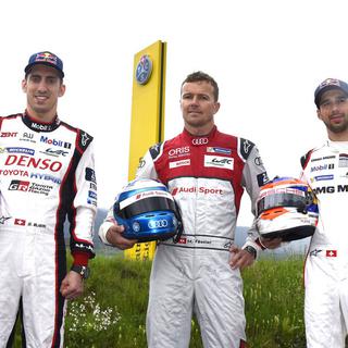 Les pilotes suisses, de gauche à droite: Sébastien Buemi, Marcel Fassler et Neel Jani. [Keystone - Christian Brun]