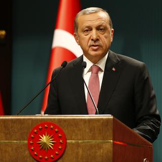 Le président turc lors de la conférence de presse à la sortie du Conseil de sécurité nationale.