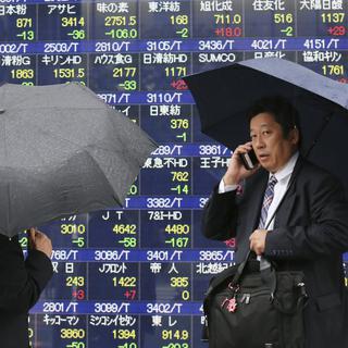 La Bourse de Tokyo a dévissé vendredi de 3,5%. [Koji Sasahara]