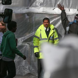 Des mineurs en provenance de Calais débarquent à Londres, 24.10.2016. [AFP - Daniel Leal-Olivas]