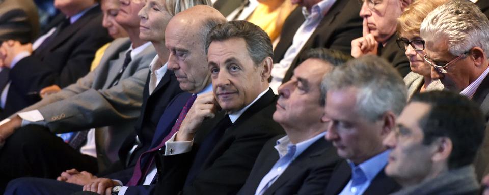 Alain Juppé, Nicolas Sarkozy, François fillon et Bruno Le Maire sont les quatre principaux candidats à la primaire de la droite et du centre en France. [AFP - Dominique Faget]