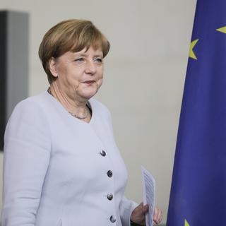 La chancelière allemande lors d'un conférence de presse lundi à Berlin. [Keystone - Markus Schreiber]