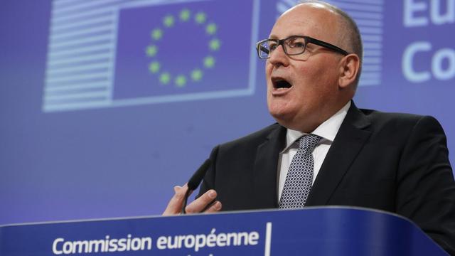 Frans Timmermans a expliqué que la Suisse devra attendre le réglement de la question britannique. [EPA/OLIVIER HOSLET]