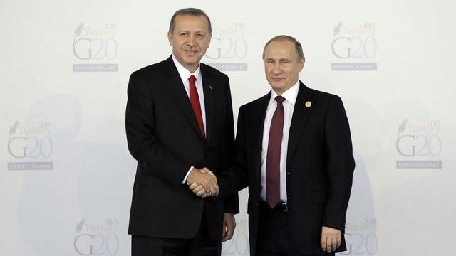 Recep Tayyip Erdogan (gauche) et Vladimir Poutine lors du G20 à Antalya, 09.08.2016. [Keystone - Lefteris Pitarakis]