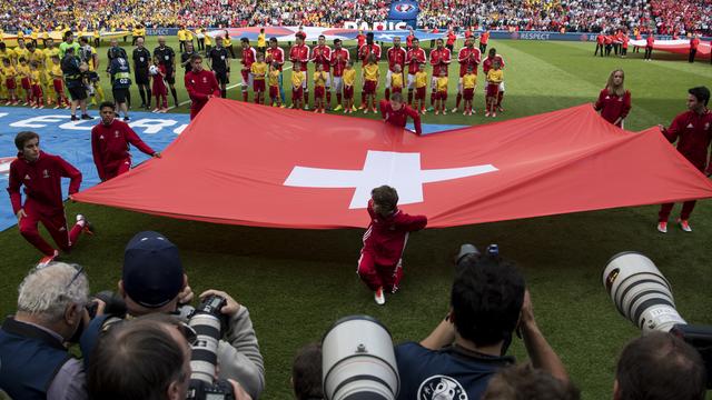 L'équipe de Suisse avant le match contre la Roumanie. [Jean-Christophe Bott]