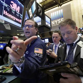 La Bourse de Wall Street a ouvert légèrement à la hausse le 14 novembre. [Richard Drew]