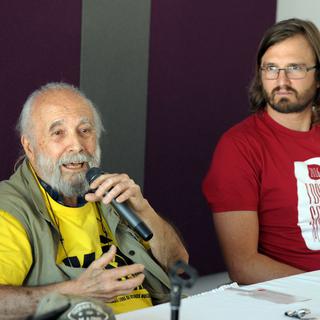 Chico Whitaker, fondateur du forum (gauche) et Raphaël Canet, organisateur de l'édition 2016. [AFP - Marc Braibant]