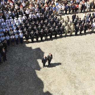 François Hollande a participé à la minute de silence au ministère de l'Intérieur à Paris. [Pool/AFP - Bertrand Guay]