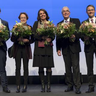 De gauche à droite: Conradin Cramer (PLR), Eva Herzog (PS), Elisabeth Ackermann (Verts), Christoph Brutschin (PS) et Lukas Engelberger (PDC), le 23 octobre 2016. [Keystone - Georgios Kefalas]