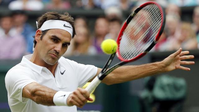 Roger Federer n'a pas eu la tâche facile face à l'Argentin Guido Pella. [AP/Keystone - Alastair Grant]