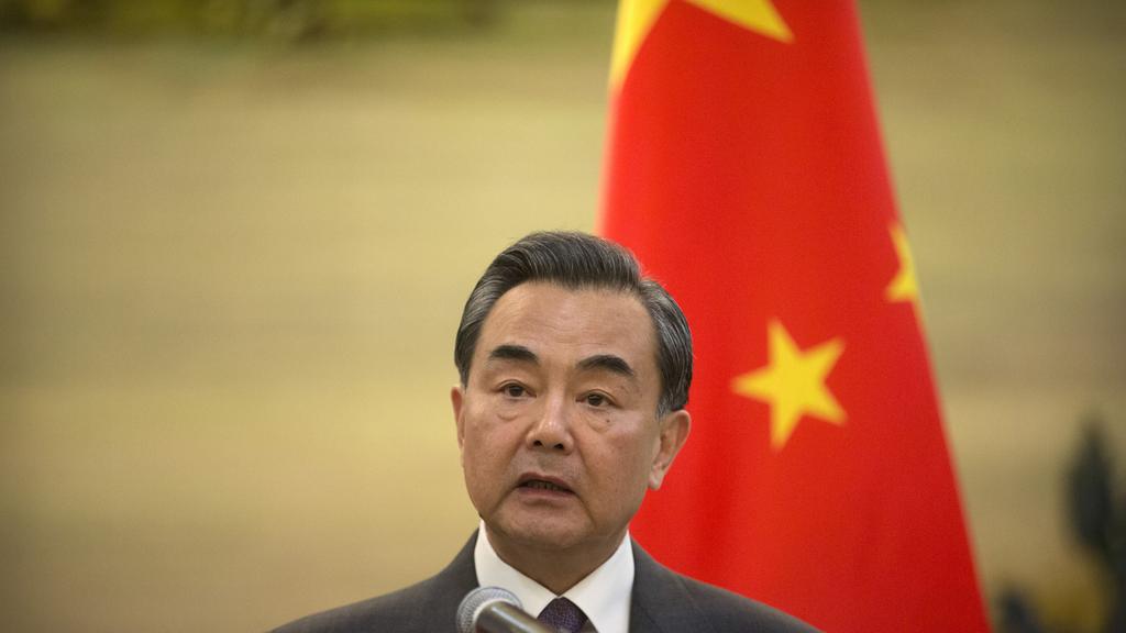 Le ministre chinois des Affaires étrangères déclare que "chaque cas sera traité selon la loi". [AP/Keystone - Mark Schiefelbein]