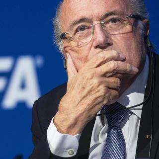 Sepp Blatter a été chargé par le DFAE d'offrir à Pierre Nkurunziza un emploi d'"ambassadeur du football" pour éviter que le despote ne brigue un troisième mandat à la tête du Burundi. [Keystone - Ennio Leanza]