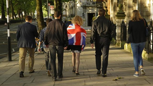 Des supporters du "leave" dans la rue au centre de Londres. [Keystone - Matt Dunham]