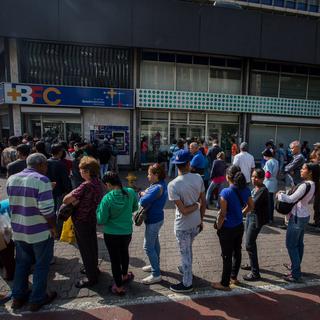 Les Vénézuéliens sont à court d'argent liquide. [keystone - EPA/Miguel Gutierrez]