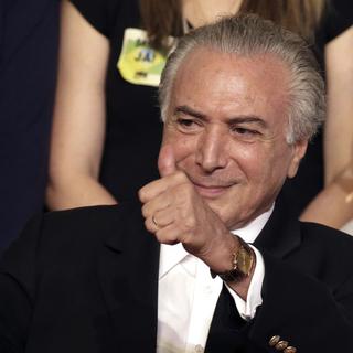 Si la procédure de destitution de Dilma Rousseff aboutit, le vice-président Michel Temer pourrait prendre sa succession à la tête du Brésil. Le pays est miné par une crise politique de grande ampleur, notamment depuis les révélations sur l'affaire Petrobras. [AP/Keystone - Eraldo Peres]