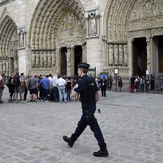 Une messe en hommage au prêtre tué a été célébrée mercredi à Paris. [AFP - Dominique Faget]